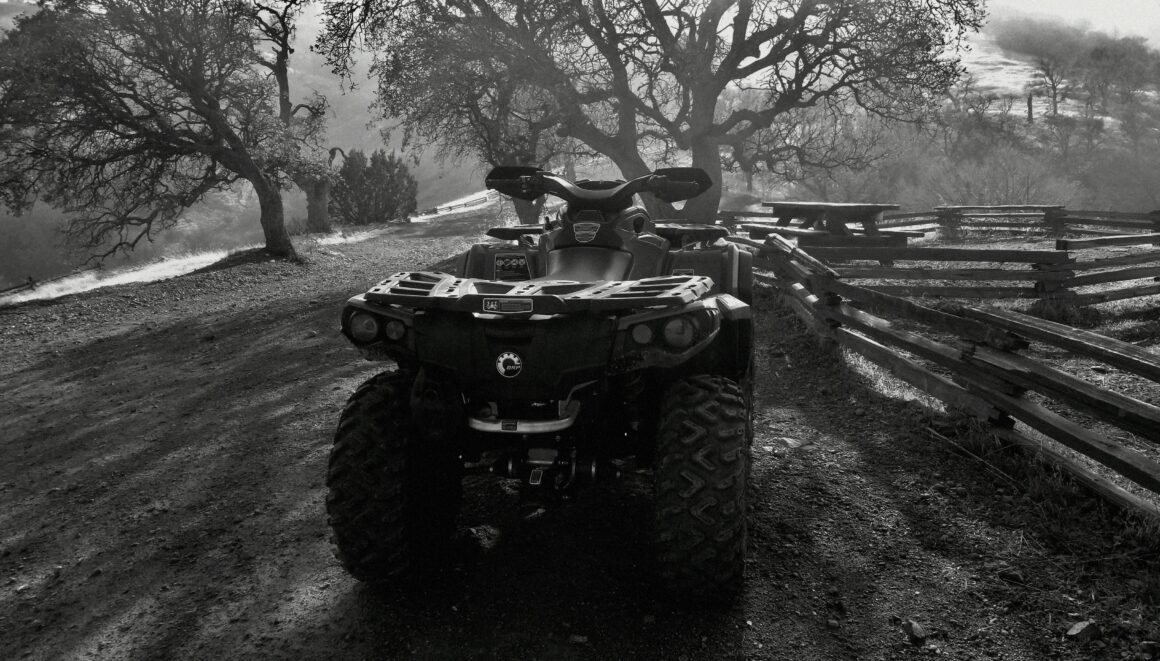 atv and utv image on a dirt road